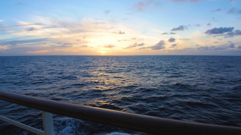 Sunset from a cruise ship on the railing