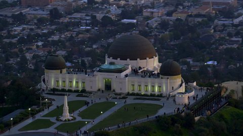 
Amazing view of the Griffith Observatory in Mount Hollywood. Crowded entrance lawn and observation deck. Los Angeles, California. Beautiful sky during sunset. Shot on Red Weapon 8K.