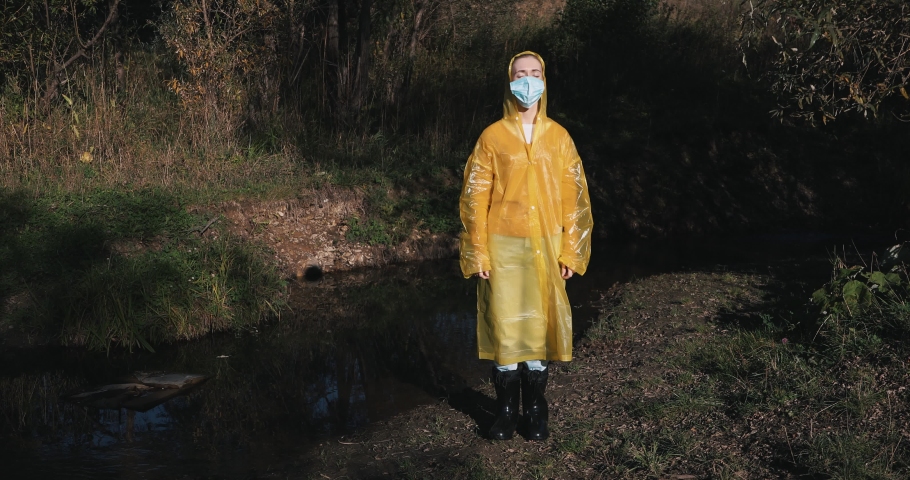 the woman rips off the mask and breathes deeply