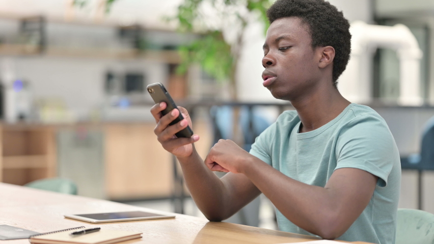 Young African Man Talking on Smartphone, Phone Call