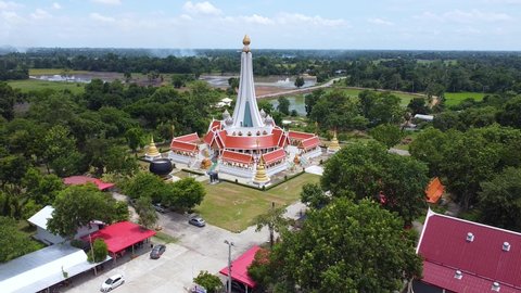 High angle, Pathumtharam temple is Temple where Buddha images are enshrined In front of the vihara, there is a large golden Buddha  Chainat Province,Thailand