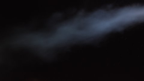 White water vapour on a black background. Close-up shot 4k. Realistic Atmospheric Gray Smoke on Black Background. White Fume Slowly Floating Rises Up. Abstract Haze Cloud. Animation Mist Effect. Smoke