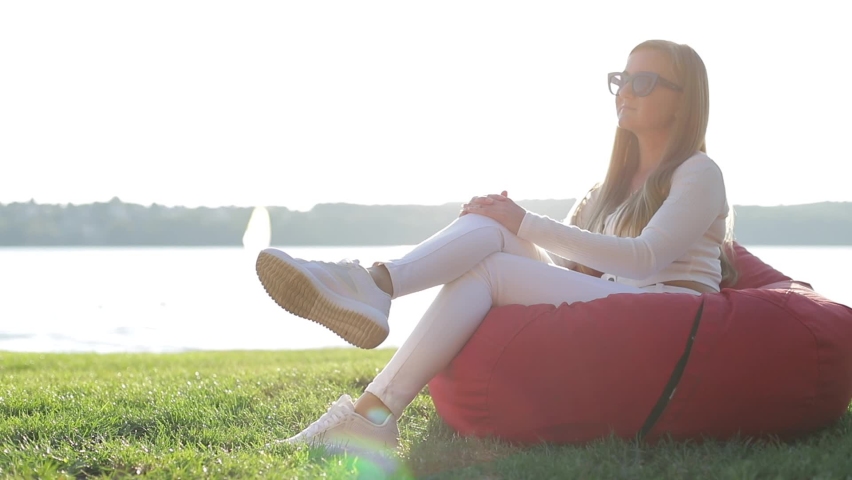 Pensive woman excitedly looks away, a woman with stress