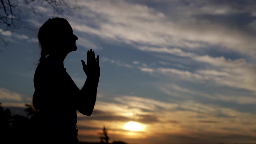 silhouette woman praying amazing dramatic sky Stock Footage Video (100% ...