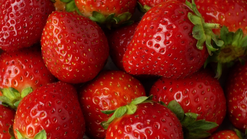 Juicy Ripe Exotic Strawberry Rotates Stock Footage Video (100% Royalty ...