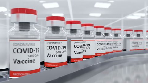 COVID-19 vaccine has been developed and ampoules with coronavirus vaccine moves to the packing on the pharmaceutical production line. It's for injecting medical professionals and people at risk, loop