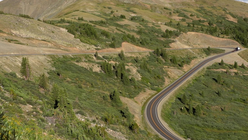 Cars driving in the Rocky Mountains of Colorado