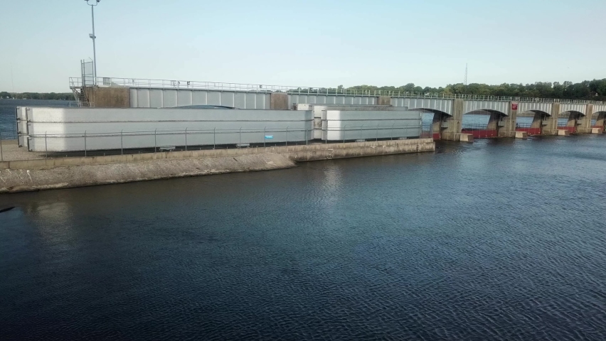 Wide aerial view along Dam 14 on the Mississippi River on a sunny summer day near Hampton Illinois