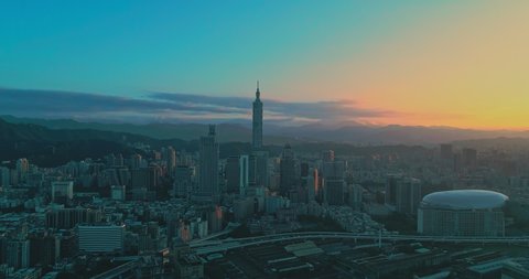 Drone shot of Taipei cityscape at dawn, Taiwan