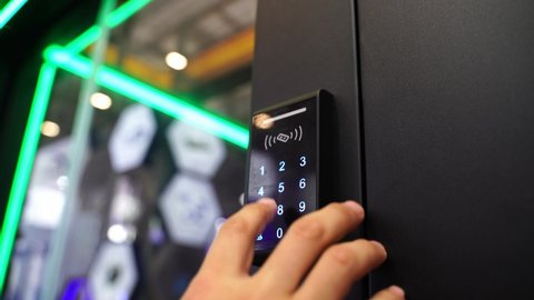 Staff push down electronic control machine with finger scan to access the door of or data center. The concept of data security or data access control.
