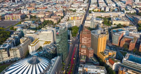 BERLIN, GERMANY - September 11, 2020: Aerial view of the Bahntower and Sony Center at Potsdamer Platz. The iconic skyscrapers of Potsdamer Platz have become a major tourist attraction. Time lapse 4K.
