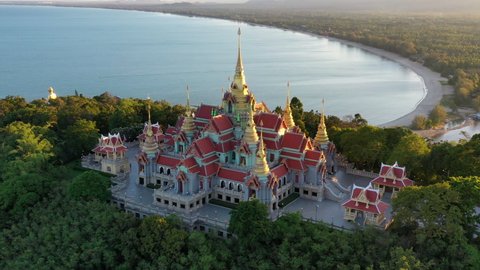 4K drone footage of the beautiful Chedi Phak Di Pra Kard buddhism temple in Prachuap Khiri Khan province Thailand