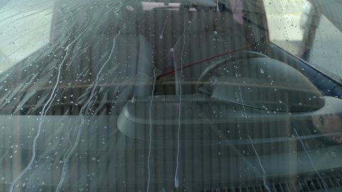 Washing dirty car closeup footage