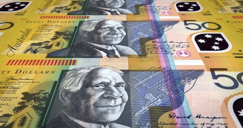 Banknotes of fifty australian dollars rolling on screen, cash money, loop