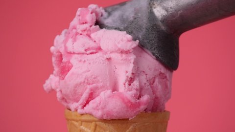Ice cream Strawberry cone on pink background.