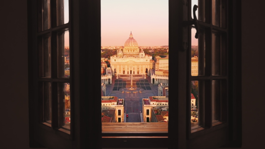 rome vatican city st peter basilica aerial view at sunrise,drone moving out from the house window Royalty-Free Stock Footage #1058932484