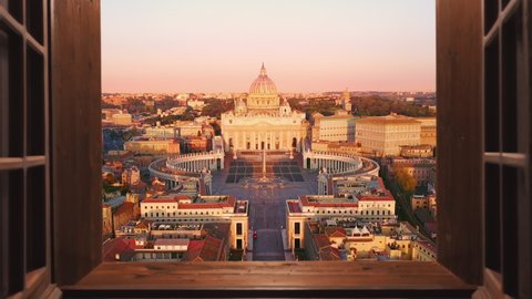 rome vatican city st peter basilica aerial view at sunrise,drone moving out from the house window