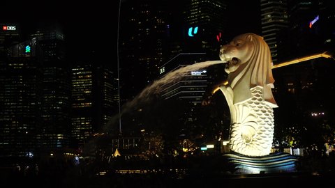 Singapore City, Singapore - 18 February, 2020 : Singapore city landmark Merlion The Merlion Statue with the City Skyline in the background, Marina Bay