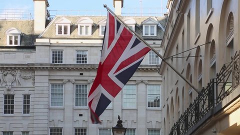 Union Jack Flag at Pole in London United Kingdom