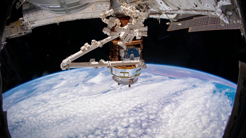 4K time lapse of Earth from Space featuring the Canada Arm module of the International Space Station. Image courtesy of NASA. Royalty-Free Stock Footage #1058966633