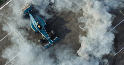 3d made formula car drifting with smoke on a 3d made track.