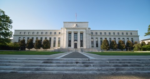 Washington D.C. / United States - August 26 2020: The Federal Reserve. Wide angle pan up steps to full, center shot of the Federal Reserve building.