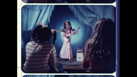1970s USA Harmony Doll from Ideal Toy. Animatronic Doll Performs on  Puppet Stage for Young Kids with Acoustic Guitar & Amplifier. 4K Overscan of Archival 16mm Film of Vintage Television Commercial