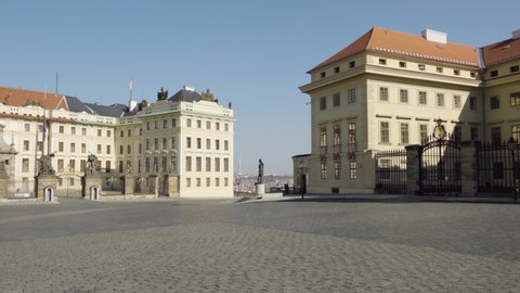 Prague Castle with front gate and empty yard without people in Prague, Czech Republic during the coronavirus pandemic