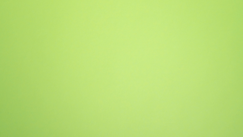 Many note paper on a green background - Stop Motion Animation