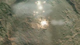 Bright Spots in Occator Crater at the Dwarf Planet Ceres. Elements of this video furnished by NASA. 