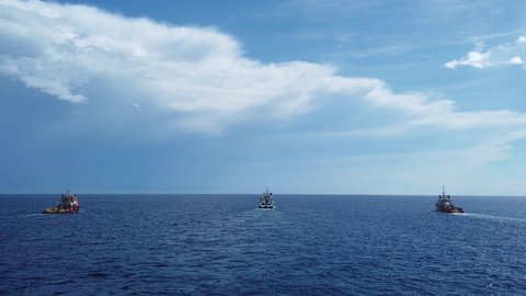 Offshore supply vessels tow the rig to the offshore location
