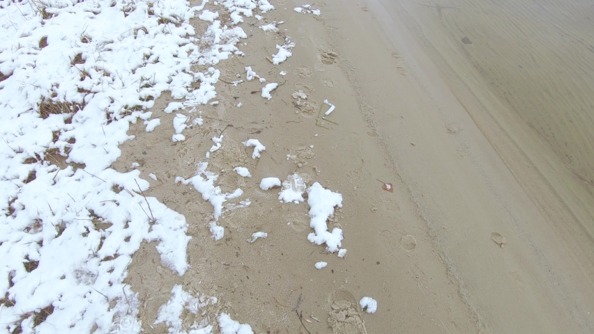 Snowfall on the banks of the Dnieper in the area of Pridneprovsk park
