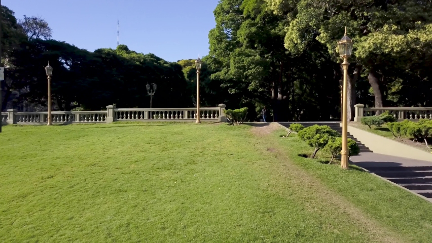 Aerial shot of a person walking on the stairs of Plaza San Martin, a park in Buenos Aires city