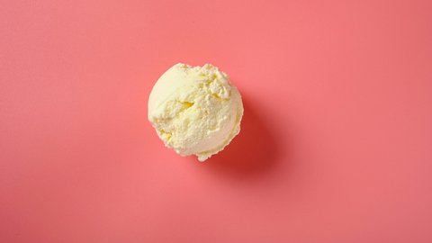 top view vanilla flavor ice cream ball melting timelapse on a pink background at 8K resolution