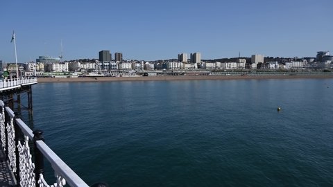 Brighton, East Sussex, UK, September 14, 2020. Brighton Seafront footage from Palace Pier on a warn and sunny day with tourist enjoying a stroll along the pier.