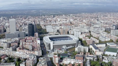 NOVEMBER 22, 2019, Madrid, Spain : Madrid cityscape and Santiago Bernabeu Stadium aerial view. Real Madrid's home is a football stadium in Spain ft. capital city Madrid skyline around the arena in 4K