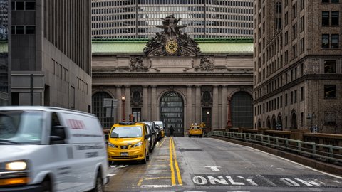 New York City - USA - Apr 15 2019: Timelapse Busy Traffic in front of Grand Central Terminal Concourse at Noon in Midtown Manhattan