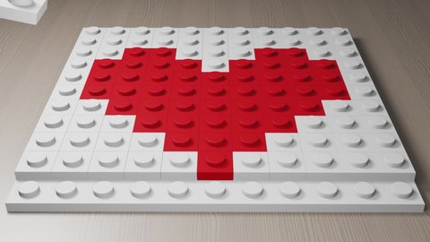 "Like" icon made from lego style blocks. Animation of plastic bricks falling down on white background from toy constructor. Red heart formed from building blocks. 3D isometric photo-realistic render.