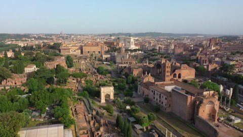 ROME, THE PARK OF THE COLOSSEUM, THE CAMPIDOGLIO AND THE ALTAR OF THE PATRIA SEEN FROM BEHIND. SHOOTING WITH DRONE