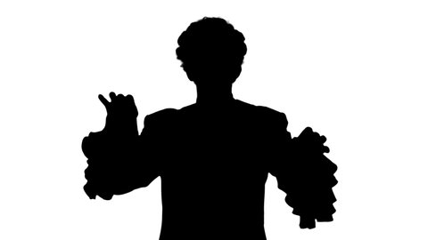 Silhouette Man dressed like Mozart conducting expressively while looking at camera.