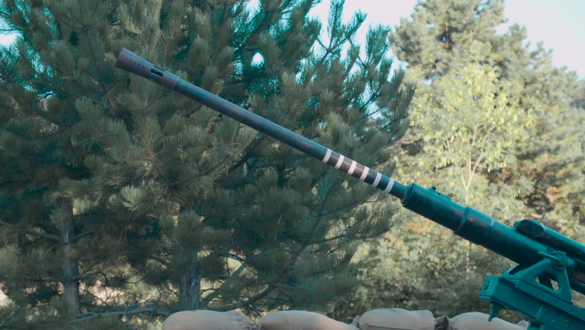 Artillery cannon from world war 2 firing side view 4K. Filmed with the cooperation of Kulturno zgodovinsko Drustvo Triglav from Slovenia 