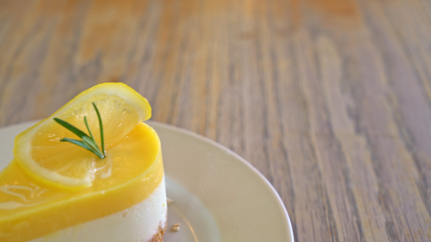 lemon cheese cake on plate Royalty-Free Stock Footage #1059108629