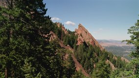 Rising aerial drone footage of the Flat Irons rock formations in Boulder, Colorado. - Powered by Shutterstock - Get 15% off with code: PIKWIZARD15