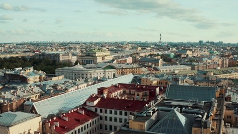A drone view from above. Saint-Petersburg or some else city in European style, Many different buildings in City view from bird eye, Beautiful clouds in the sky