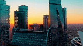 Aerial shot of futuristic Moscow International Business Center at sunset. Moscow Downtown skyscrapers. The concept of success. the camera is going right..High quality 4k footage
