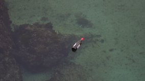 Glass bottle floating. The seas fill us with garbage, man destroys his own habitat and there is no remedy, we pollute the water with our waste - Powered by Shutterstock - Get 15% off with code: PIKWIZARD15