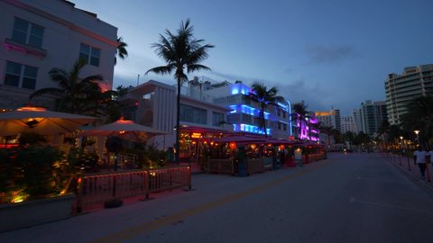 MIAMI BEACH, FL, USA - SEPTEMBER 16, 2020: Neon hotels Miami Beach Ocean Drive SOBE 4k footage