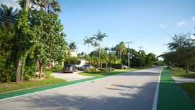 Motion footage Royal Palm Avenue Miami Beach with painted green bike lane