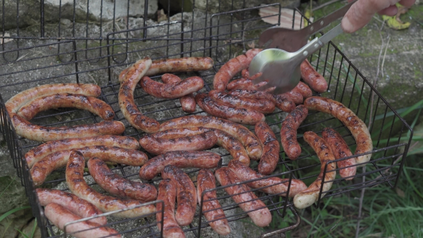 Cafes and restaurants, cooking, picnic, oriental kitchen concept - close-up men