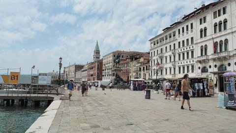 Venice, Italy. September 14, 2020. Landscape of the monumental waterfront  Riva degli Schiavoni. A pedestrian way that leads to St Mark's Square. Few tourists during Covid-19 or Coronavirus time